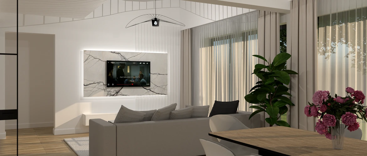 mężczyzna z ołówkiem pochylony nad planami